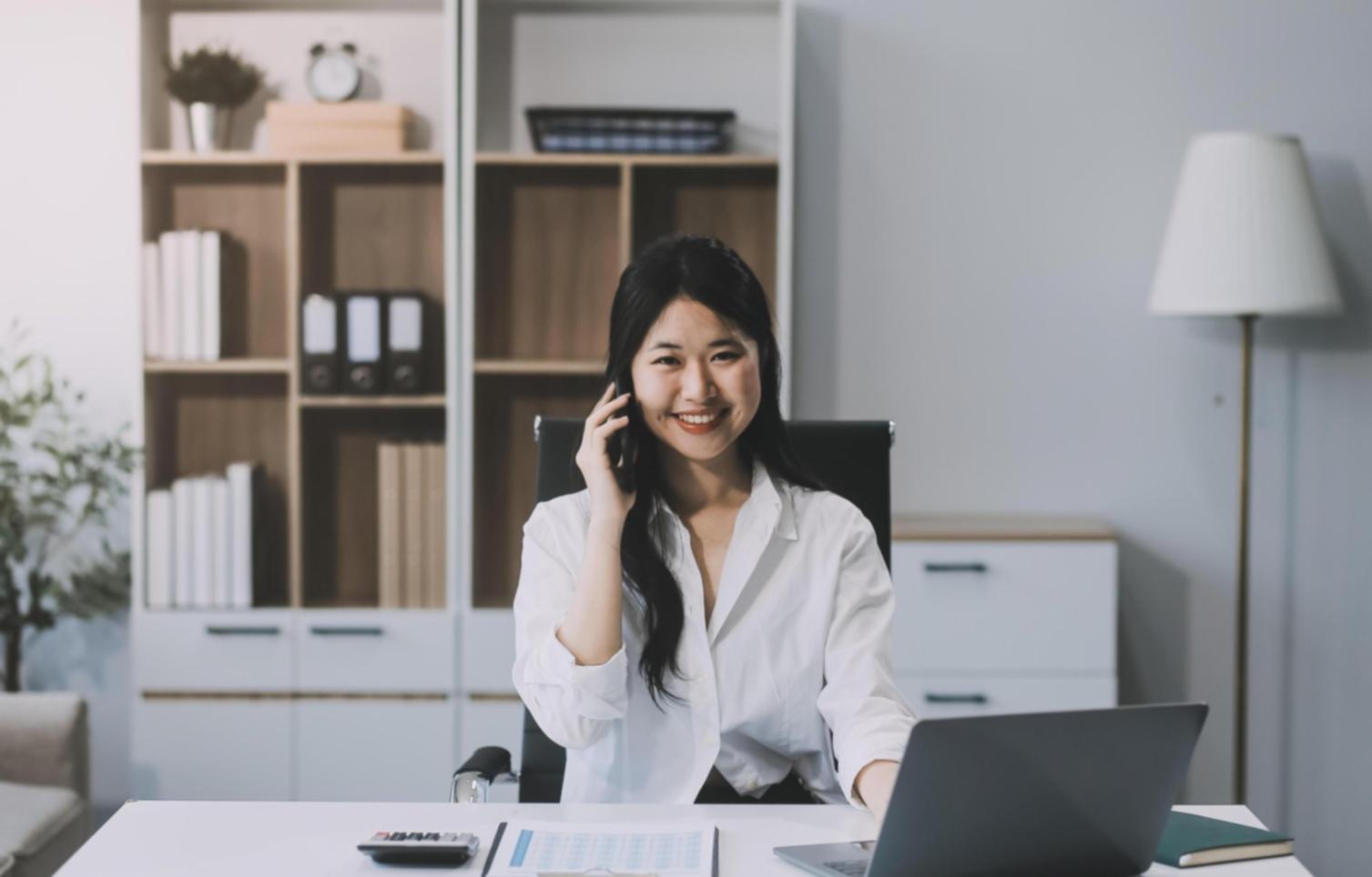 Professional workspace showing financial analysis tools and business planning resources